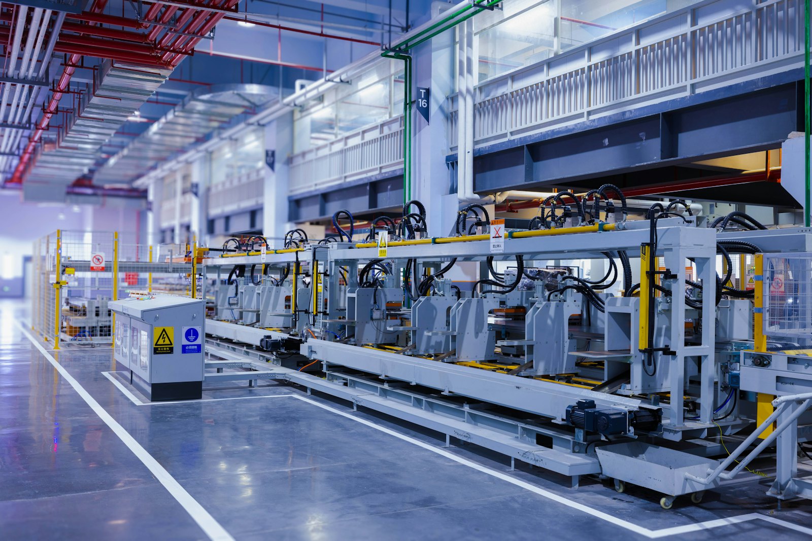 Inside a modern automated production hall — a bright, clean manufacturing environment