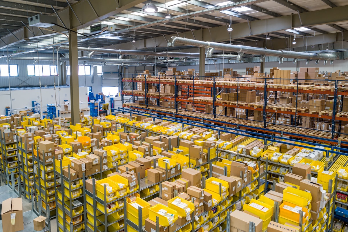 Warehouse shelving with storage bins — where inventory problems become visible
